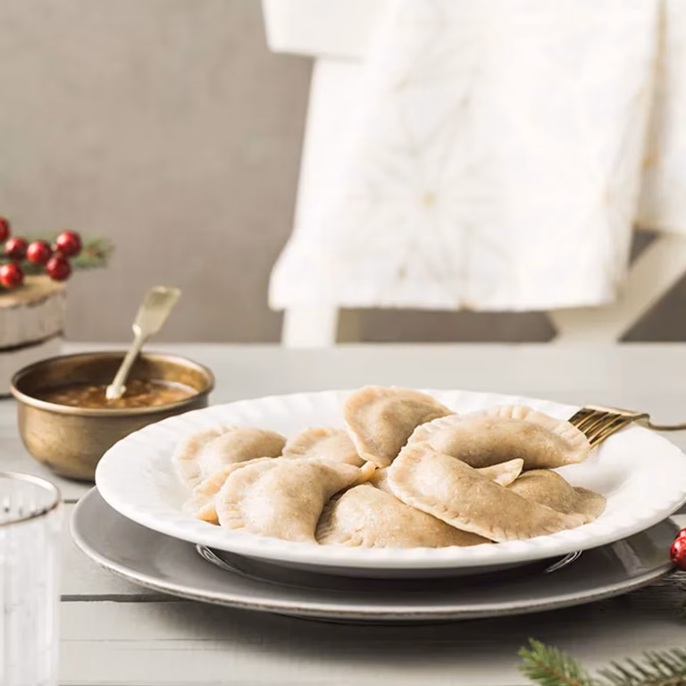Pierogi z karpiem i sosem korzenno-pomarańczowym
