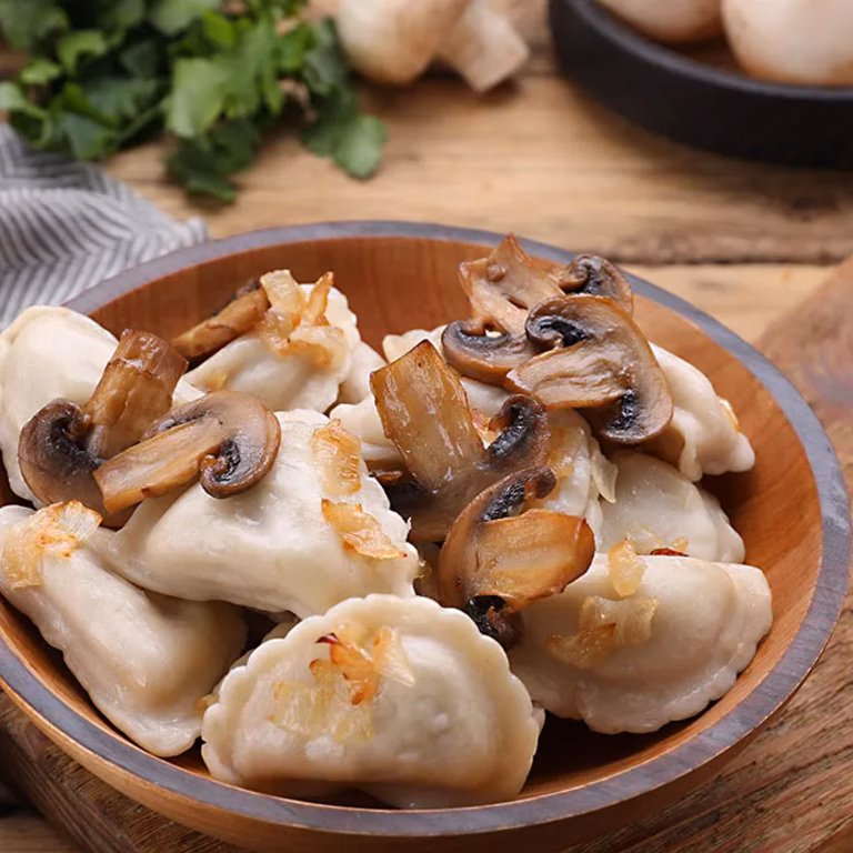 Pierogi z kapustą i pieczarkami